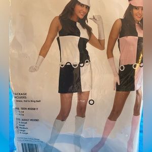 Halloween costume that includes hat, dress and belt.
